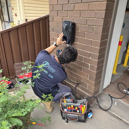 Electrician installing FoxESS EV Charger