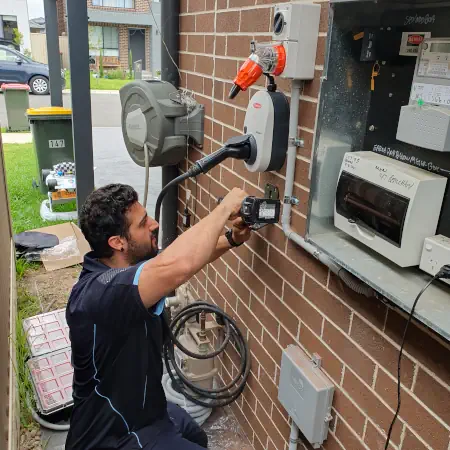 Electrician installing Fronius Wattpilot