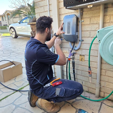 Electrician installing Evnex EV Charger