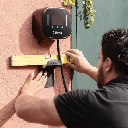 Electrician installing Ohme Home Pro